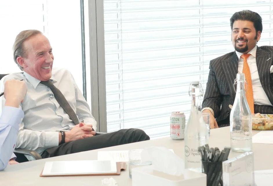 Members of the Board in conversation.