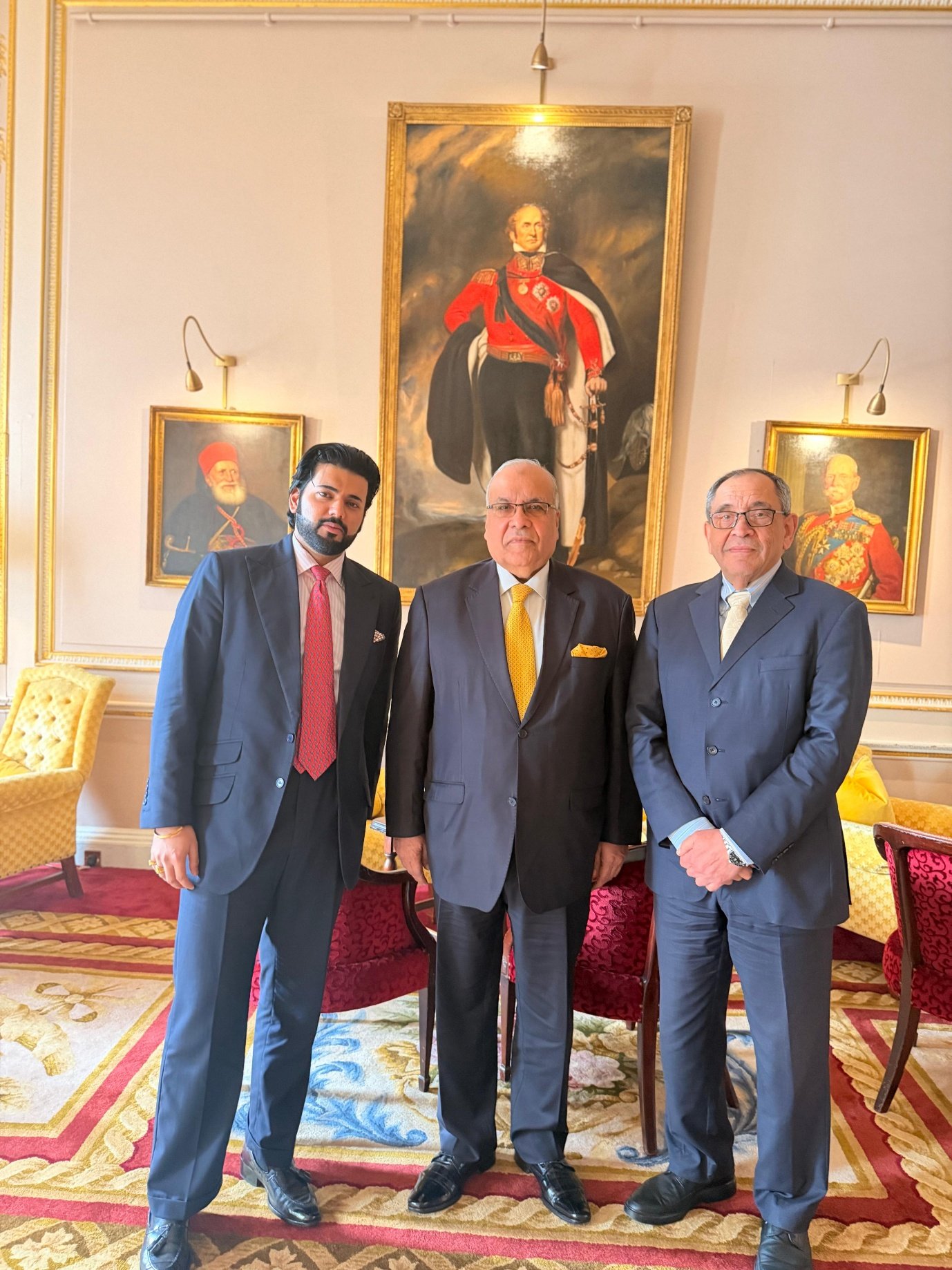 Three Xyra Group principals — standing portrait, Office of the Founding Principal